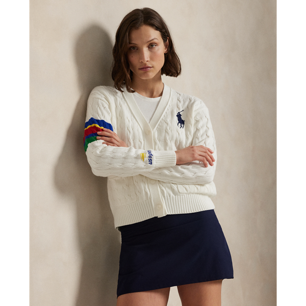 Celebrating  Ralph Lauren Lauren's 20th anniversary in partnership with the US Open, this V-neck cardigan is part of our 2025 US Open Tennis Championships collection and was designed exclusively for the tournament's official umpire uniform. It features the official US Open logo, custom-developed corozo buttons and our signature embroidered Big Pony. The medium-weight layer combines breathable cotton yarn with our iconic cable-knit motif.