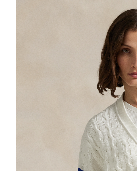 Celebrating  Ralph Lauren Lauren's 20th anniversary in partnership with the US Open, this V-neck cardigan is part of our 2025 US Open Tennis Championships collection and was designed exclusively for the tournament's official umpire uniform. It features the official US Open logo, custom-developed corozo buttons and our signature embroidered Big Pony. The medium-weight layer combines breathable cotton yarn with our iconic cable-knit motif.