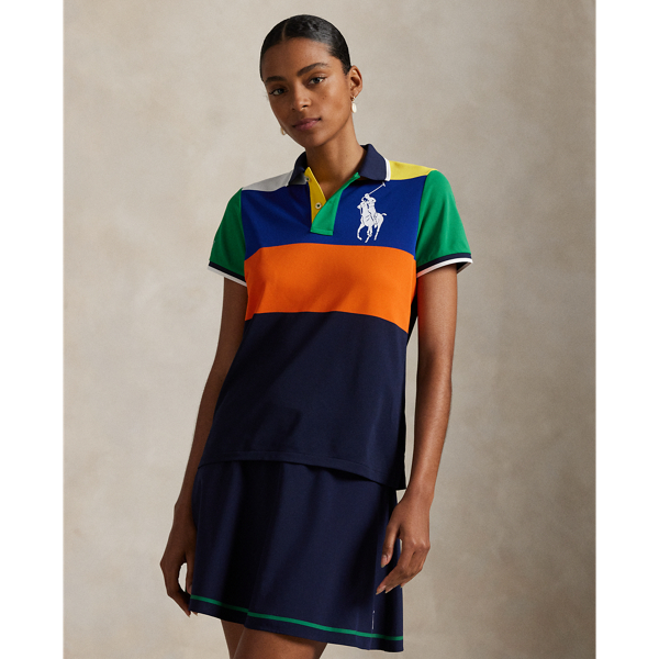 Celebrating  Ralph Lauren Lauren's 20th anniversary in partnership with the US Open, this Polo shirt is part of our 2025 US Open Tennis Championships collection. It is inspired by the ball crew uniform  Ralph Lauren Lauren designed for this year's tournament and is crafted from moisture-wicking stretch piqué fabric. In addition to the sporting event's official logo, it features two iterations of our iconic Big Pony.