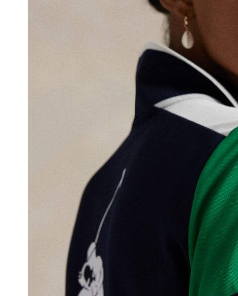 Celebrating  Ralph Lauren Lauren's 20th anniversary in partnership with the US Open, this Polo shirt is part of our 2025 US Open Tennis Championships collection. It is inspired by the ball crew uniform  Ralph Lauren Lauren designed for this year's tournament and is crafted from moisture-wicking stretch piqué fabric. In addition to the sporting event's official logo, it features two iterations of our iconic Big Pony.