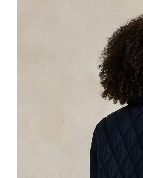 Featuring a quilted construction, this lightly insulated barn jacket is crafted with water-repellent fabric that is accented with cotton corduroy trim and finished with our signature embroidered Pony.