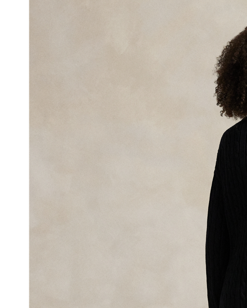 In a relaxed silhouette, this jumper dress is cable-knit with cotton and accented by a half-zip placket. Our signature Pony is embroidered on the chest for pure Polo style.