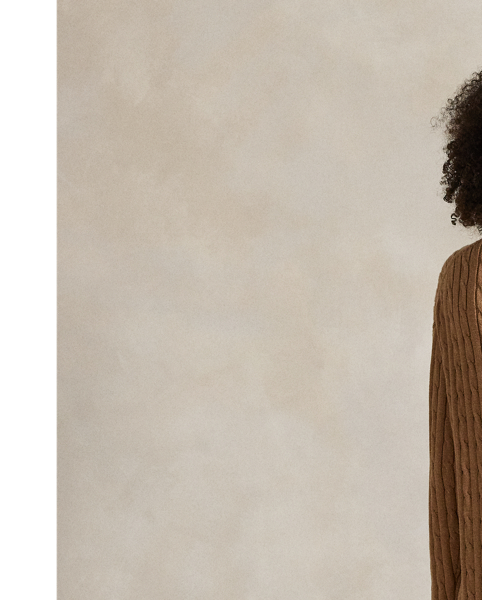 In a relaxed silhouette, this jumper dress is cable-knit with cotton and accented by a half-zip placket. Our signature Pony is embroidered on the chest for pure Polo style.
