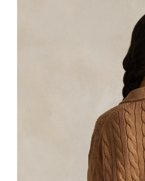 This cotton jumper combines  Ralph Lauren Lauren's signature cable-knit construction with details reminiscent of the classic Polo shirt, including a rib-knit collar and split placket.