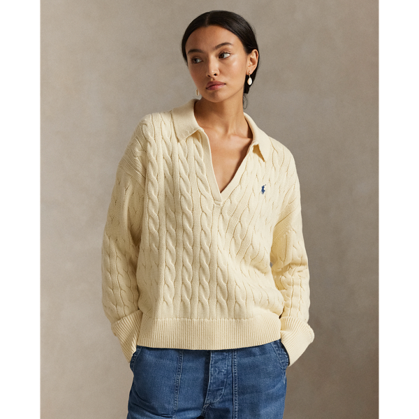 This cotton jumper combines  Ralph Lauren Lauren's signature cable-knit construction with details reminiscent of the classic Polo shirt, including a rib-knit collar and split placket.