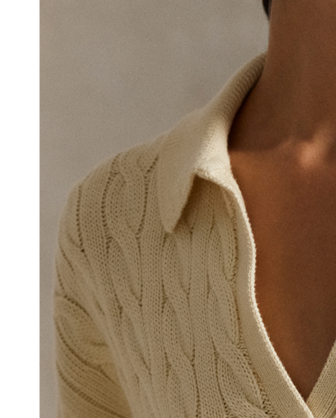 This cotton jumper combines  Ralph Lauren Lauren's signature cable-knit construction with details reminiscent of the classic Polo shirt, including a rib-knit collar and split placket.