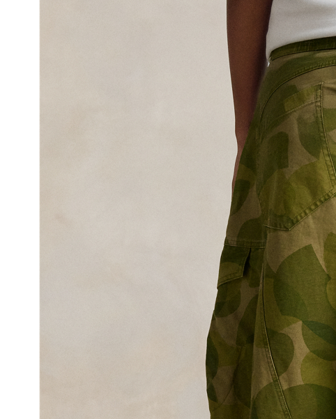 These medium-weight cargo trousers are woven with cotton for a relaxed, curved-leg silhouette and printed with a graphic motif. The panelled construction is detailed with surplus-inspired pocketing.