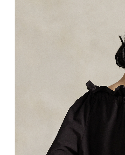 Woven with a blend of cotton and silk yarns, this off-the-shoulder blouse is defined by its relaxed shape and ruffled neckline, which is split at the centre and detailed with self-ties.