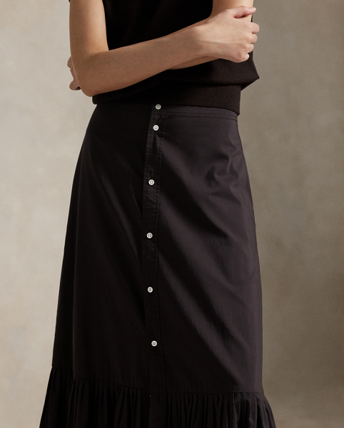 Crafted with cotton and silk yarns for an A-line silhouette, this panelled midi skirt is distinguished by its buttoned placket and ruffled hem with knife-pleating.