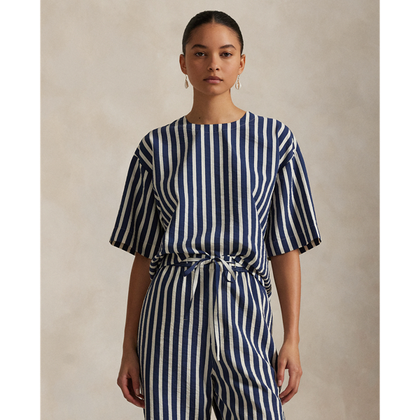 Crafted from a silk blend, this striped short-sleeve top features a clean-lined construction with a panelled back yoke and dropped shoulders.