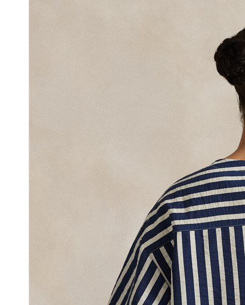 Crafted from a silk blend, this striped short-sleeve top features a clean-lined construction with a panelled back yoke and dropped shoulders.
