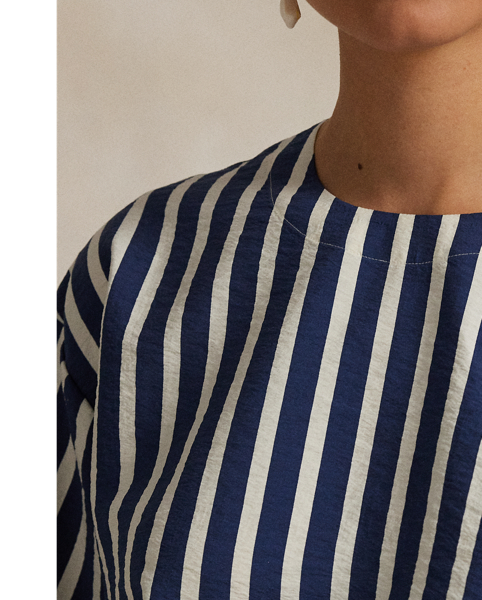 Crafted from a silk blend, this striped short-sleeve top features a clean-lined construction with a panelled back yoke and dropped shoulders.