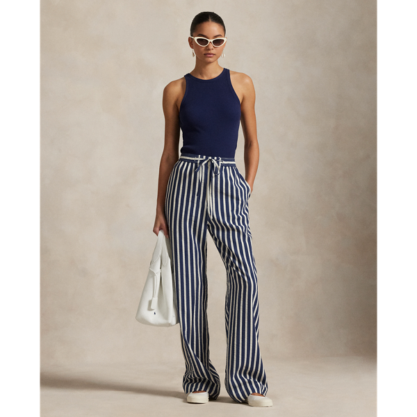 Crafted with a silk blend, these trousers feature a clean-lined construction that combines a wide-leg silhouette with vertical stripes and a drawstring detail at the waist.