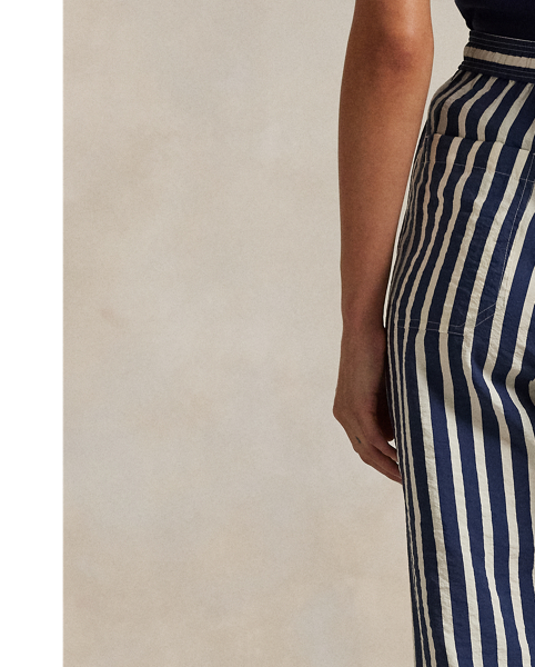 Crafted with a silk blend, these trousers feature a clean-lined construction that combines a wide-leg silhouette with vertical stripes and a drawstring detail at the waist.