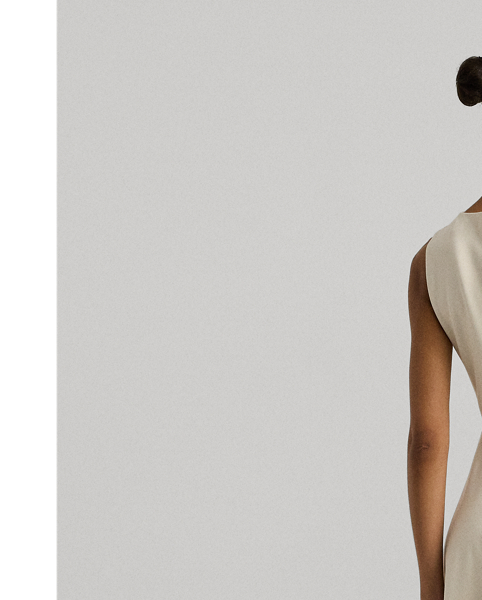 This sleeveless dress is designed with body-shaping princess seams and is crafted with smooth ponte, amplifying its feminine fit-and-flare silhouette.