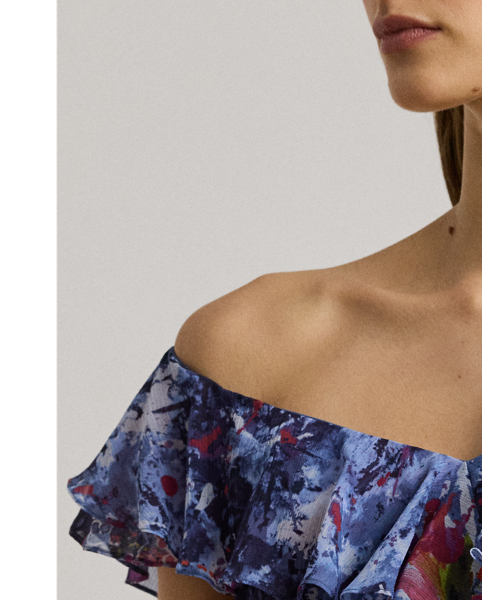 Cascading ruffles and a tiered skirt construction bring effortless movement to this off-the-shoulder cocktail dress, which depicts the season's painterly abstract print. This enchanting style is finished with a belted waist for a defined silhouette.