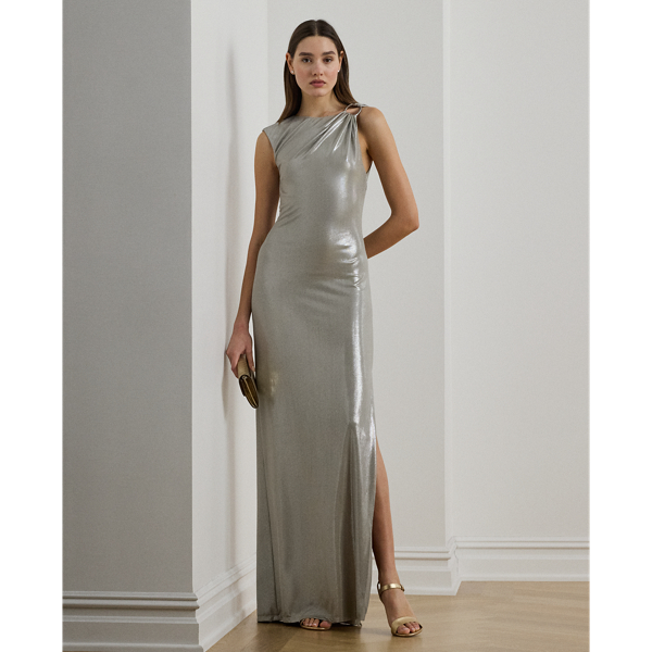 Cut from eye-catching metallic jersey for a fluid drape, this floor-length gown features a statuesque column silhouette and a horseshoe-shaped "LRL"-engraved buckle on the shoulder.