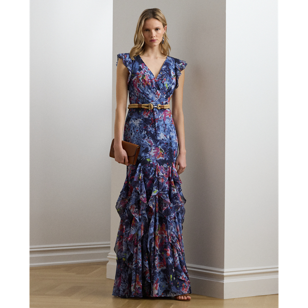 Showcasing the season's painterly abstract print, this floor-sweeping gown pairs crinkle georgette with cascading ruffles to create effortless movement with each step. Flutter sleeves amplify its enchanting sensibility, while a coordinating self-belt defines the waist.