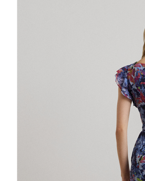 Showcasing the season's painterly abstract print, this floor-sweeping gown pairs crinkle georgette with cascading ruffles to create effortless movement with each step. Flutter sleeves amplify its enchanting sensibility, while a coordinating self-belt defines the waist.