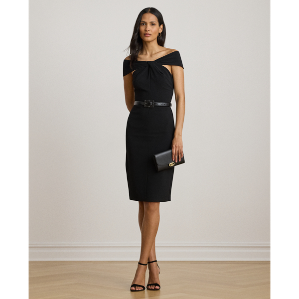 Distinguished by a twist-front off-the-shoulder neckline, this refined cocktail dress features a sheath silhouette crafted from smooth, stretch-infused crepe.