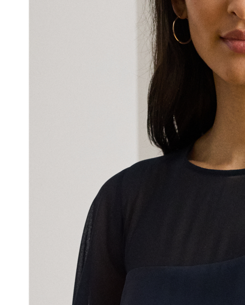 Turn heads at your next event in this glamorous georgette gown, which is designed with a floor-length, semi-sheer cape overlay and a statuesque column silhouette.