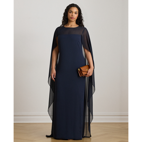 Turn heads at your next event in this glamorous georgette gown, which is designed with a floor-length, semi-sheer cape overlay and a statuesque column silhouette.