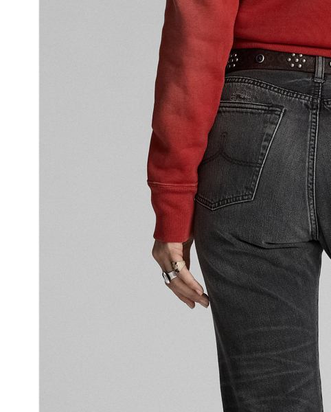 Straight-fitting jeans made with 10 oz. cotton-blend denim. Dusty black wash. Repaired. Raw-edge hems. Sanforized to minimise shrinkage.