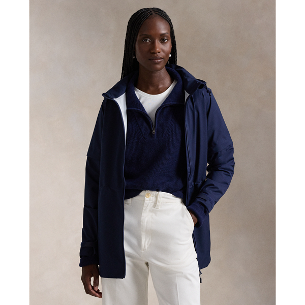 Crafted with water-repellent twill fabric that has refined stretch and wind-blocking properties, this versatile jacket is constructed with sealed interior seams, a breathable back vent, and a convertible silhouette thanks to its zip-off drawstring hood and snap-off sleeves.
