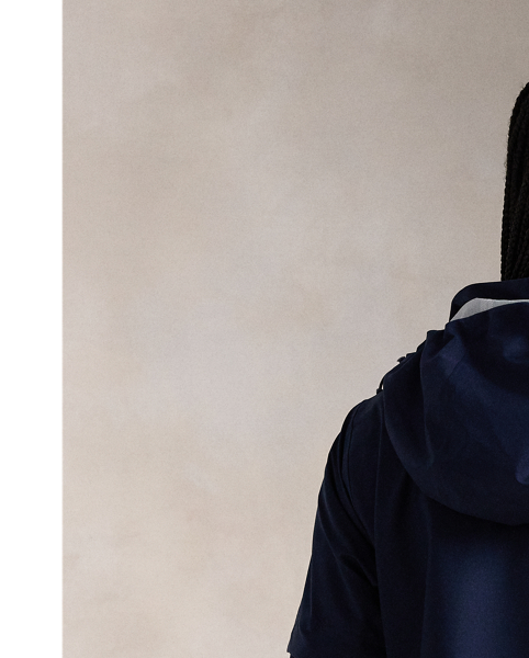 Crafted with water-repellent twill fabric that has refined stretch and wind-blocking properties, this versatile jacket is constructed with sealed interior seams, a breathable back vent, and a convertible silhouette thanks to its zip-off drawstring hood and snap-off sleeves.
