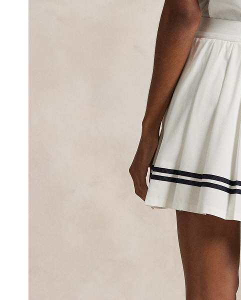 Featuring a pleated construction, this performance skort is made with moisture-wicking fabric that has refined stretch properties. Our signature RLX logo accents the elasticised waist.
