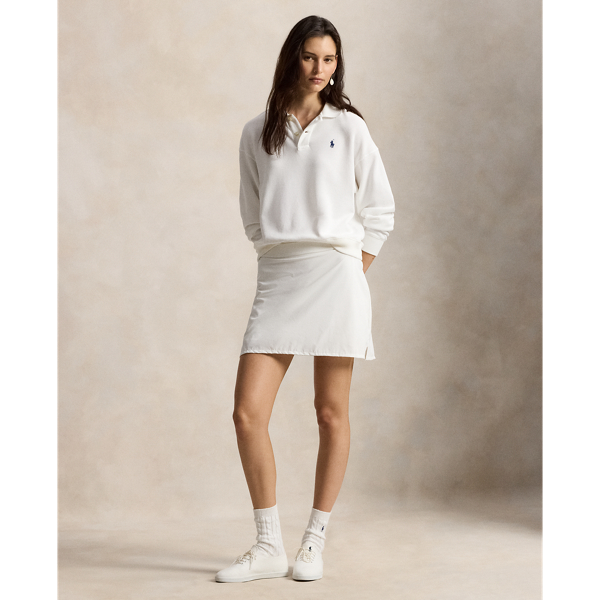 Designed for superior comfort and mobility, this performance-driven skort is crafted from moisture-wicking fabric with refined stretch properties. It's finished with our "RLX" logo on the hem.