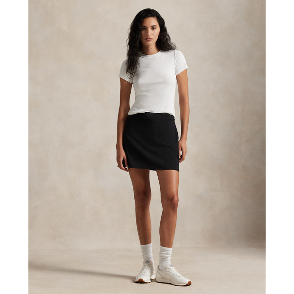 Designed for superior comfort and mobility, this performance-driven skort is crafted from moisture-wicking fabric with refined stretch properties. It's finished with our "RLX" logo on the hem.