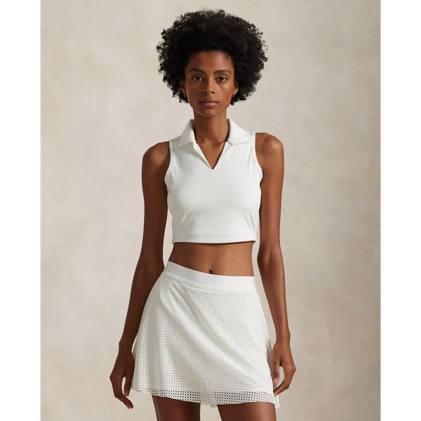 Crafted with interlock fabric for a cropped silhouette, this sleeveless performance Polo has a generous amount of stretch for superior recovery. It's finished with a perforated back panel and our signature RLX logo.