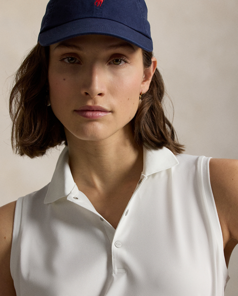 This sleeveless Polo shirt is cut from lightweight stretch piqué mesh with a straight silhouette. Our "RLX" logo is printed on the right shoulder and engraved on the metal snaps.