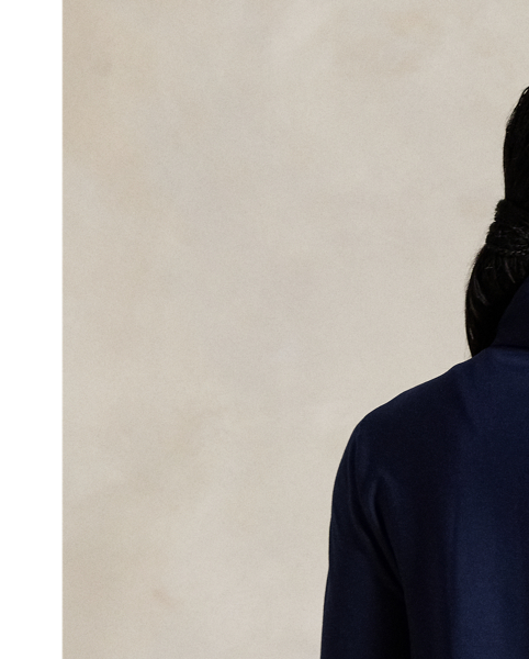 Combining a lightly filled front body panel with soft French terry on the sleeves and the back, this jacket features a two-way zip front and thumbholes on the cuffs. Our signature "RLX" logo adorns the right shoulder.