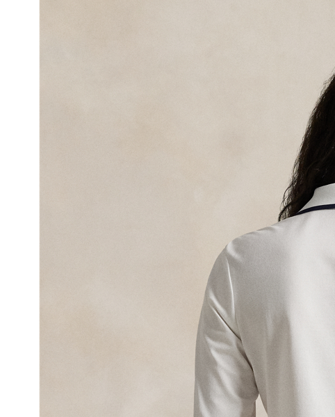 This long-sleeve Polo shirt is crafted with breathable jersey fabric and features the Polo Bear and our signature "RLX" logo embroidered at the chest.