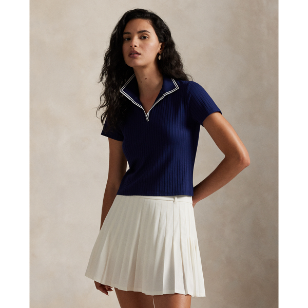 This Slim Fit Polo shirt has a lightweight, rib-knit texture achieved through a drop-needle knitting technique and features cricket-inspired striped trim at the collar and placket.