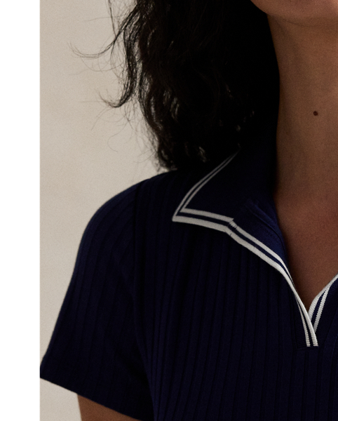This Slim Fit Polo shirt has a lightweight, rib-knit texture achieved through a drop-needle knitting technique and features cricket-inspired striped trim at the collar and placket.
