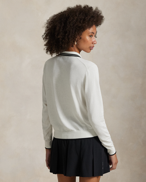 Combining the look of our signature Polo shirt with the versatility and ease of a cardigan jumper, this cotton-blend layer is made with COOLMAX fibres to help keep you cool, dry and comfortable.