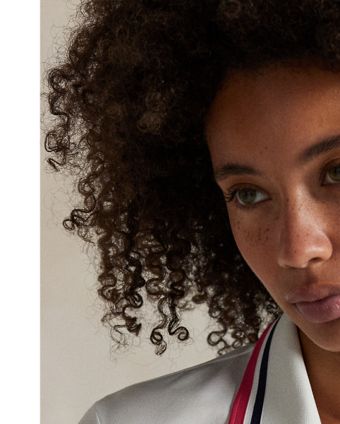 Crafted with jersey that has been washed for softness, this Tailored Fit long-sleeve Polo shirt is detailed with striped tipping and combines our signature embroidered Pony and "RLX" logo.