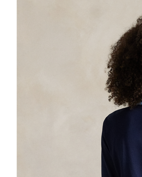 Crafted with jersey that has been washed for softness, this Tailored Fit long-sleeve Polo shirt is detailed with striped tipping and combines our signature embroidered Pony and "RLX" logo.