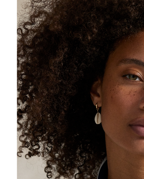 Crafted with jersey that has been washed for softness, this Tailored Fit long-sleeve Polo shirt is detailed with striped tipping and combines our signature embroidered Pony and "RLX" logo.