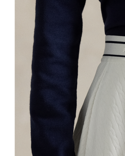 Double-knit jacquard fabric with a cable motif defines this A-line skirt, which features a striped elasticised waist accented by our "RLX" logo.