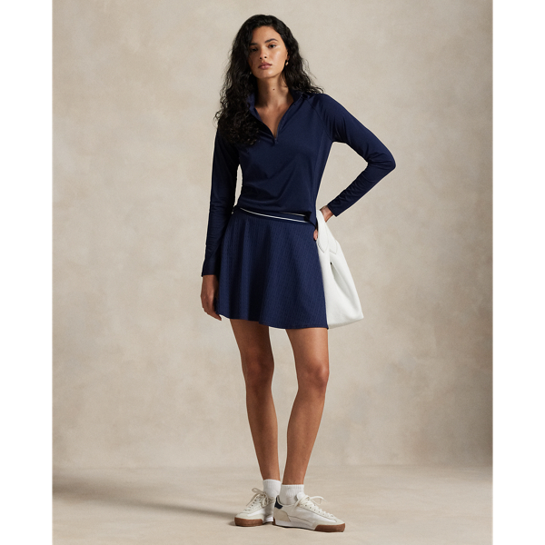 Double-knit jacquard fabric with a cable motif defines this A-line skirt, which features a striped elasticised waist accented by our "RLX" logo.