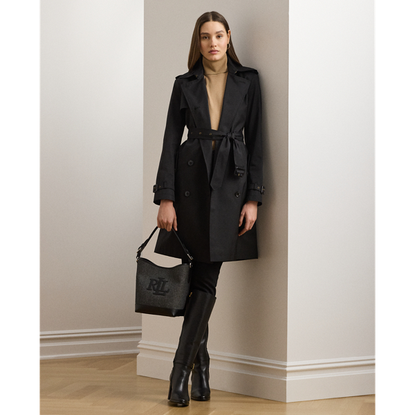 Rendered in a soft cotton blend, Lauren's take on the trench coat showcases traditional styling details, including a double-breasted silhouette and buttoned shoulder epaulets. A buckled self-belt accentuates the waist, while "Lauren Ralph Lauren Lauren"-engraved horn-effect buttons lend a signature finish.
