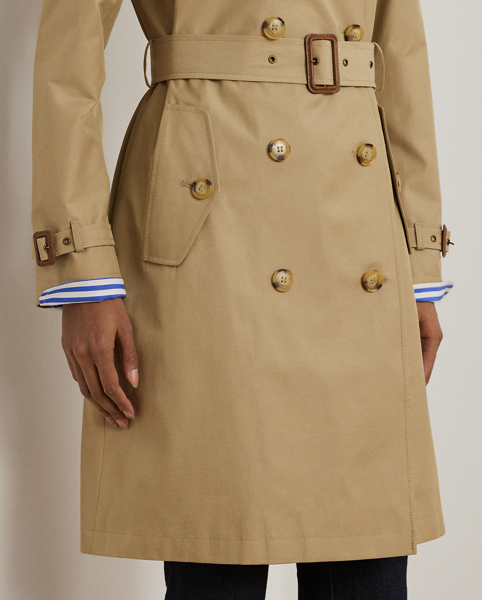 Rendered in a soft cotton blend, Lauren's take on the trench coat showcases traditional styling details, including a double-breasted silhouette and buttoned shoulder epaulets. A buckled self-belt accentuates the waist, while "Lauren Ralph Lauren Lauren"-engraved horn-effect buttons lend a signature finish.
