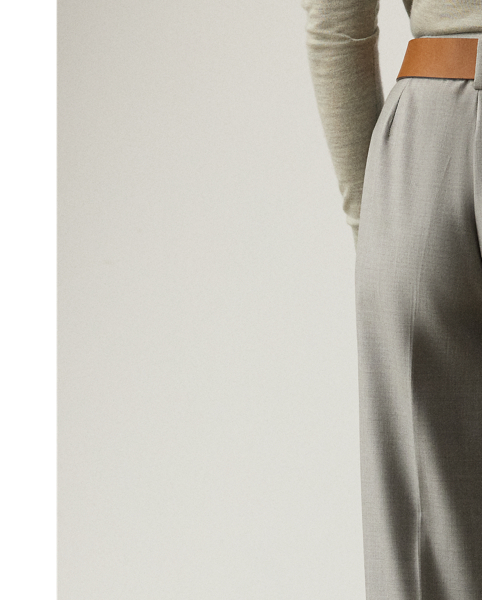 Drawing inspiration from  Ralph Lauren Lauren's men's trousers, the Stamford is designed with a Hollywood waist, a high rise, front pleats and crisp leg creases. Crafted in Portugal, this iteration is made from extra-fine worsted Italian wool, which is specially selected for its brushed, lofty finish and remarkable drape. A self-belt with a petite square-shaped buckle creates definition at the waist.
