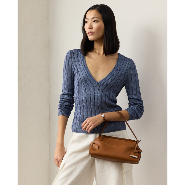 Our iconic cable-knit V-neck jumper combines impeccable craftsmanship with the refined luxury of high-shine silk, which is specially selected for its soft hand and beautiful sheen.