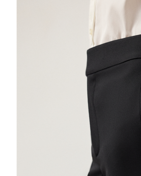 The Barnet puts a contemporary spin on timeless tuxedo dressing, as it’s cut for a low rise and a wide-leg silhouette. Traditionally tailored with waist darts and crisp creases, this flat-front trouser is crafted from wool barathea and features tonal silk side stripes.