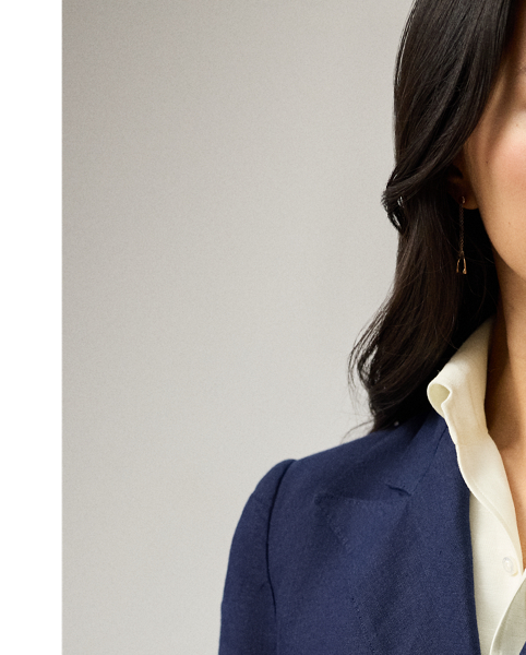 Debuted as a men's sporting style in 19th-century Britain, the double-breasted jacket is one of  Ralph Lauren Lauren's enduring signatures. This version of the iconic Camden is crafted with rustic-yet-chic linen in a classic construction for season-spanning wear. Our signature polished buttons complete the look.